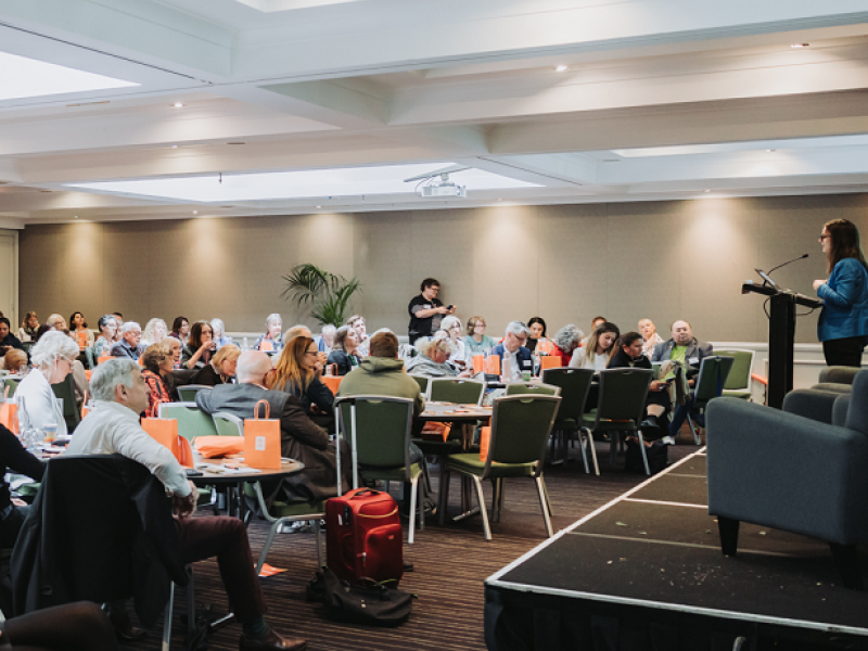 Audience listening to a speaker